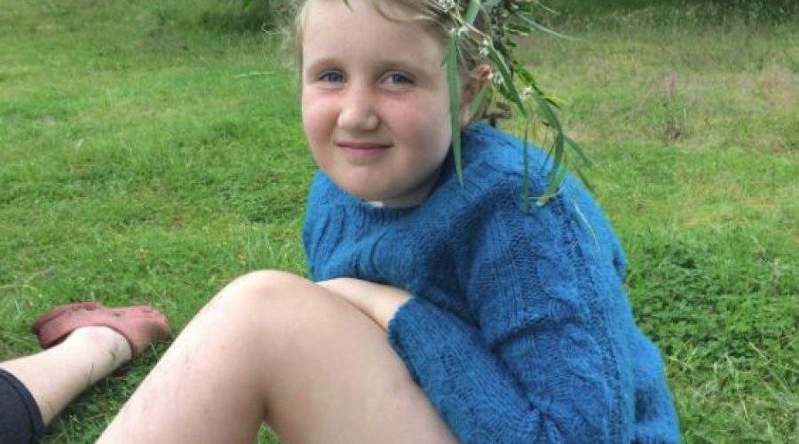 Lola says: "In November, we had an overnight camp with KCC at Wiritoa Lake. We had a fire and toasted marshmallows. There was a swing going over the lake as well as three other playground swings. Here I am wearing a wreath I made at camp."